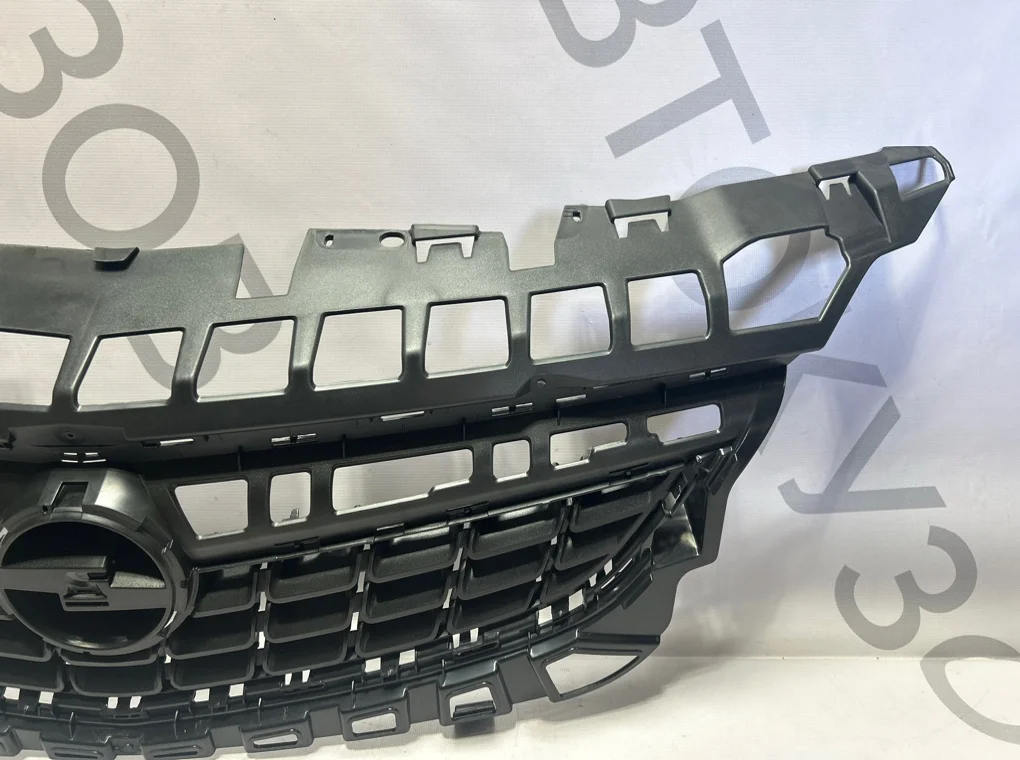 Решетка радиатора Opel Astra 2009-2013 - миниатюра 5