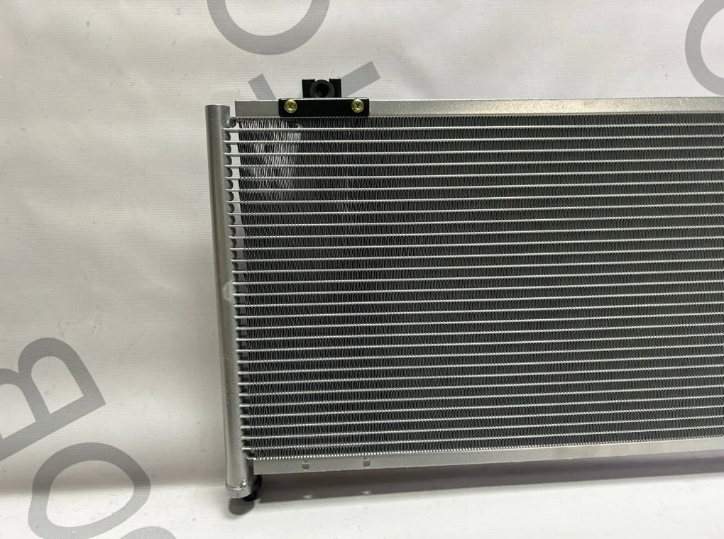 Радиатор кондиционера Kia Spectra 2001-2011 - миниатюра 9