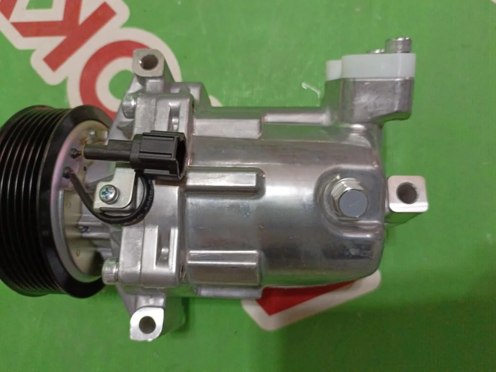 Компрессор кондиционера Nissan Tiida 2004-2014 - миниатюра 2