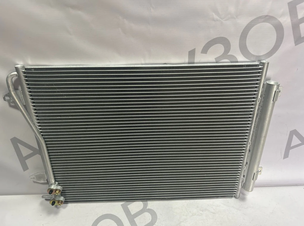 Радиатор кондиционера Volkswagen Passat 2005-2010 - миниатюра 2