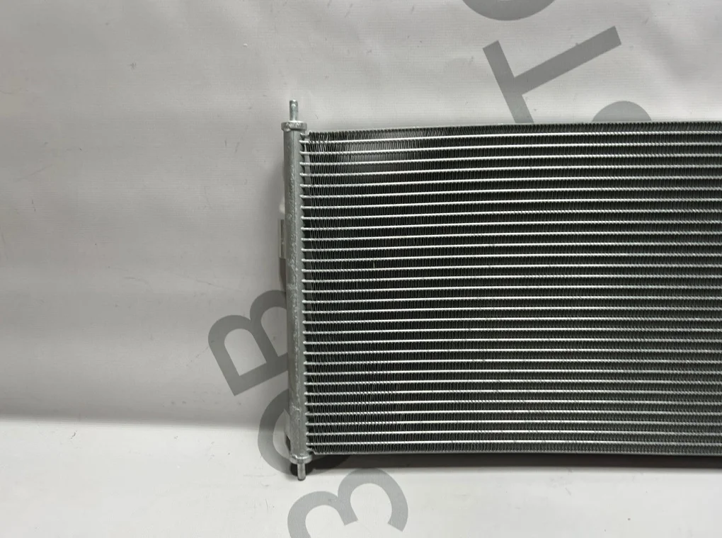 Радиатор кондиционера Nissan Almera 2000-2006 - миниатюра 3