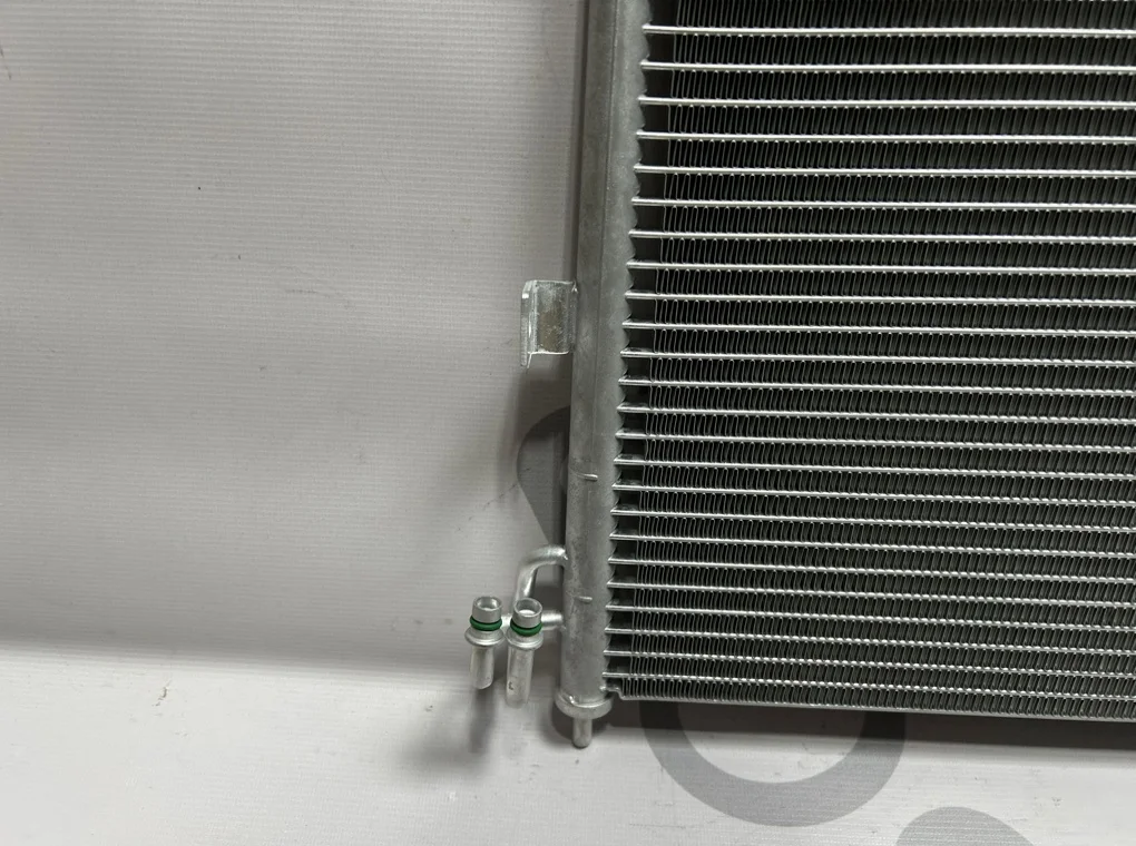 Радиатор кондиционера Nissan Almera 2000-2006 - миниатюра 7
