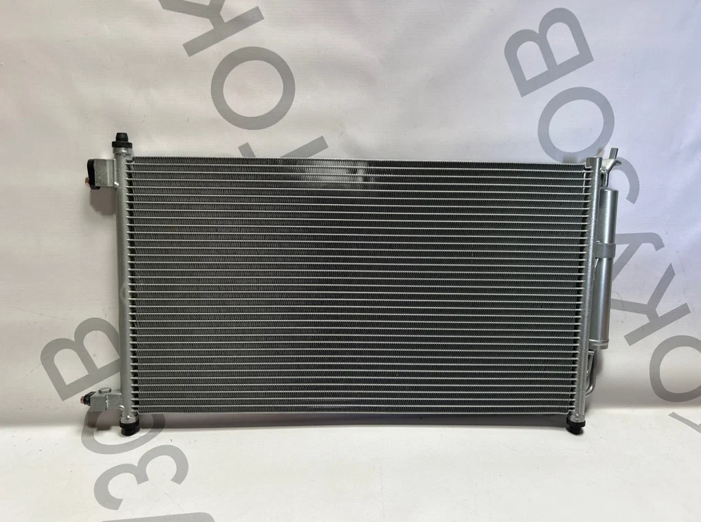 Радиатор кондиционера Nissan Tiida C11 2004-2014 - миниатюра 6