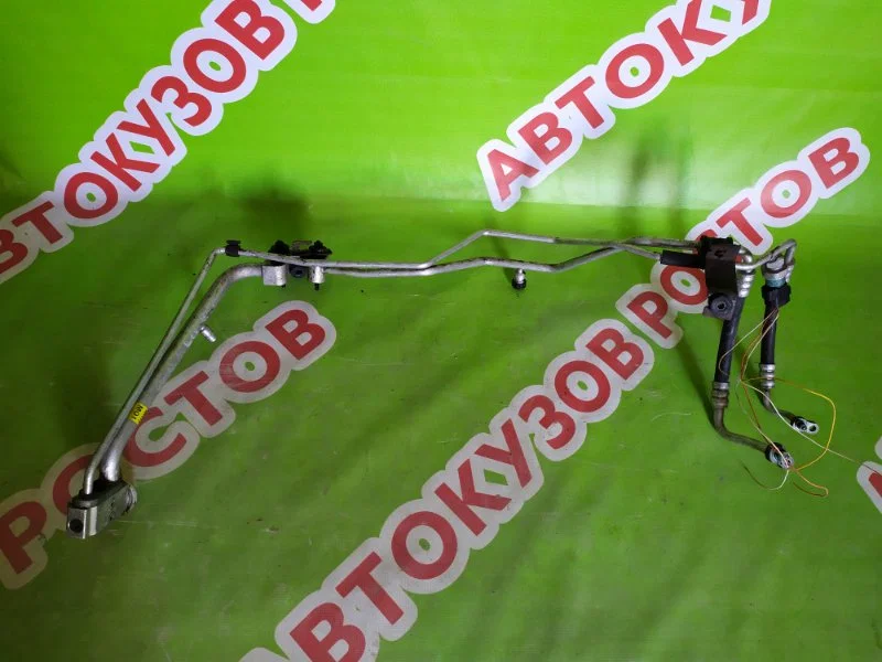 Трубка кондиционера Kia Sportage 2 2.0 2009