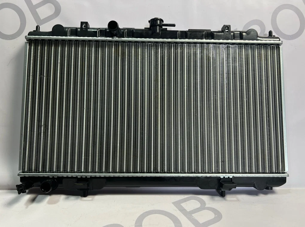 Радиатор охлаждения Nissan Almera N16 МТ 2000-2006 - миниатюра 4