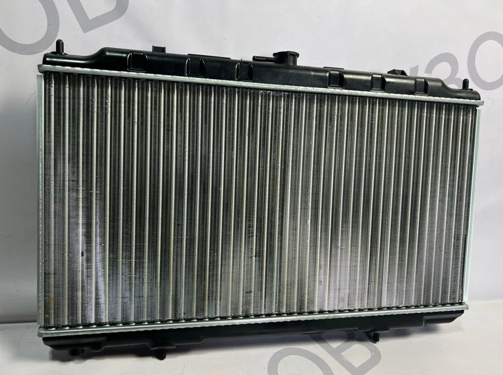 Радиатор охлаждения Nissan Almera N16 МТ 2000-2006 - миниатюра 8