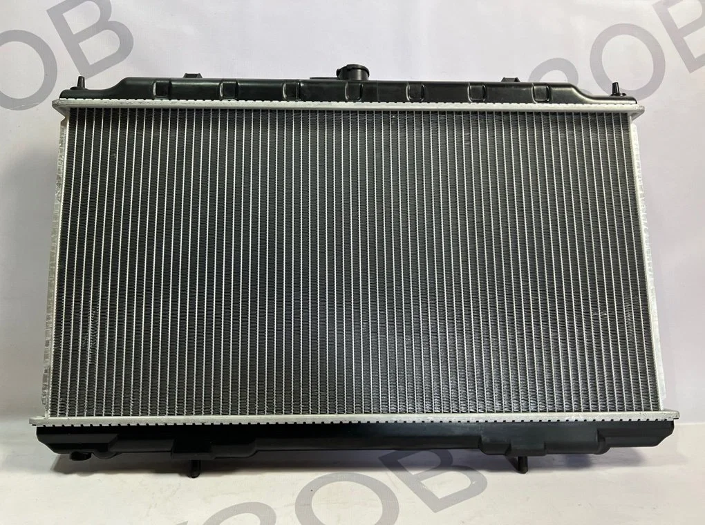 Радиатор охлаждения Nissan Almera N 16 2001-2008 - миниатюра 10