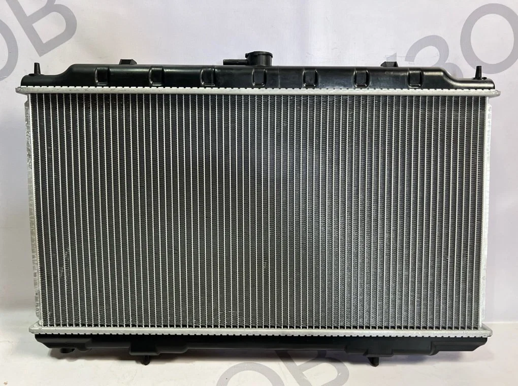Радиатор охлаждения Nissan Almera N 16 2001-2008 - миниатюра 6
