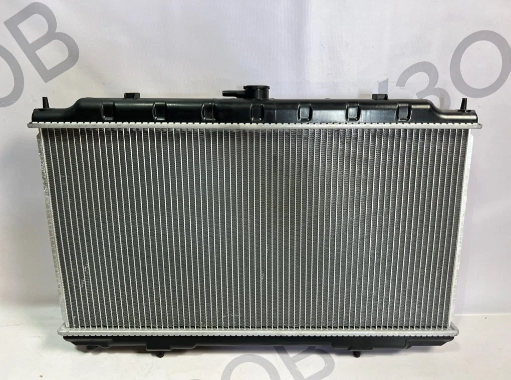 Радиатор охлаждения Nissan Almera N 16 2001-2008 - миниатюра 9
