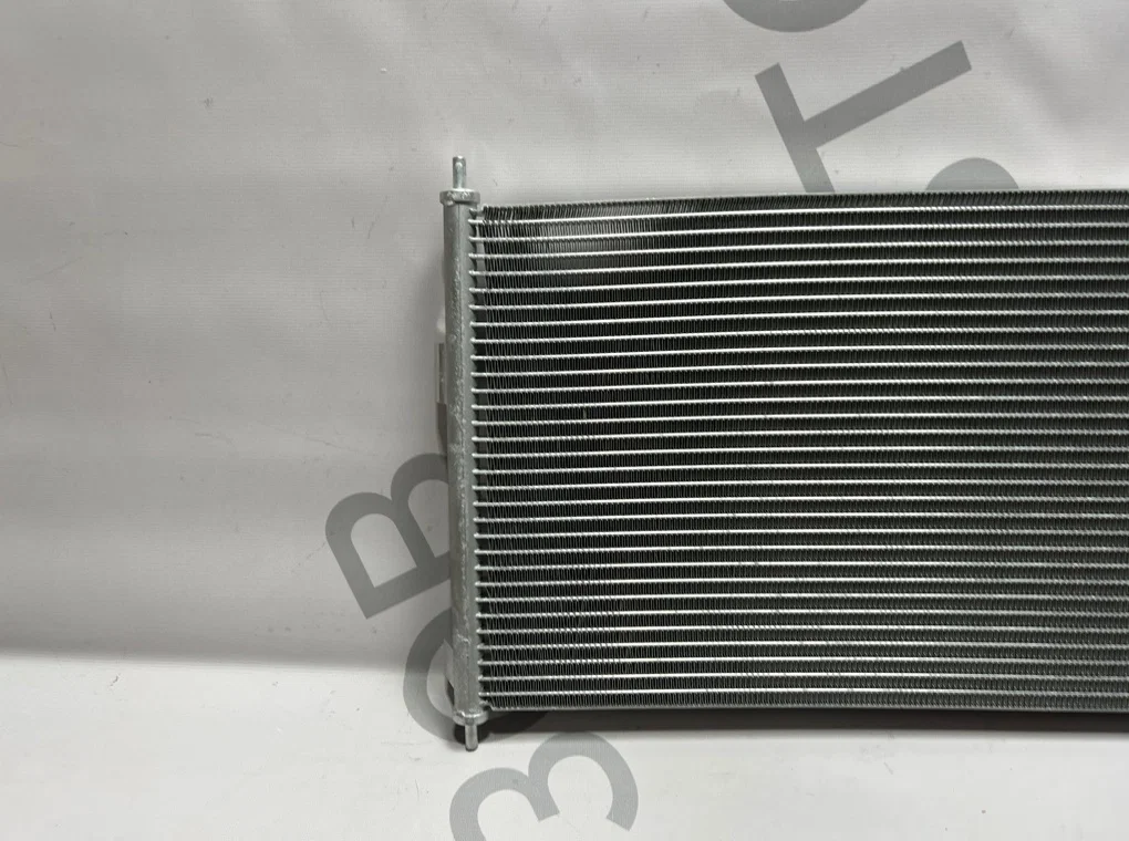 Радиатор кондиционера Nissan Almera N16 2000-2006 - миниатюра 3