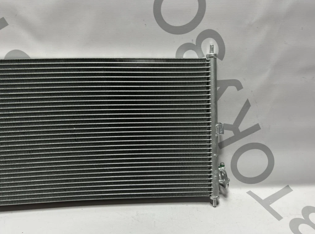 Радиатор кондиционера Nissan Almera N16 2000-2006 - миниатюра 4