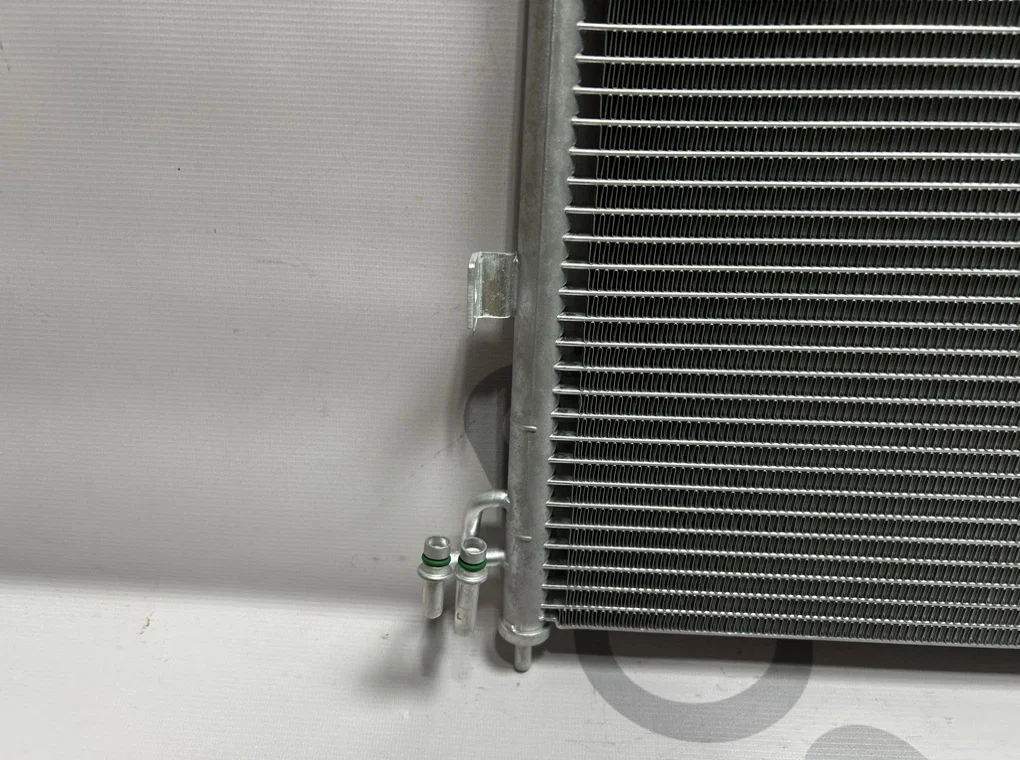 Радиатор кондиционера Nissan Almera N16 2000-2006 - миниатюра 7