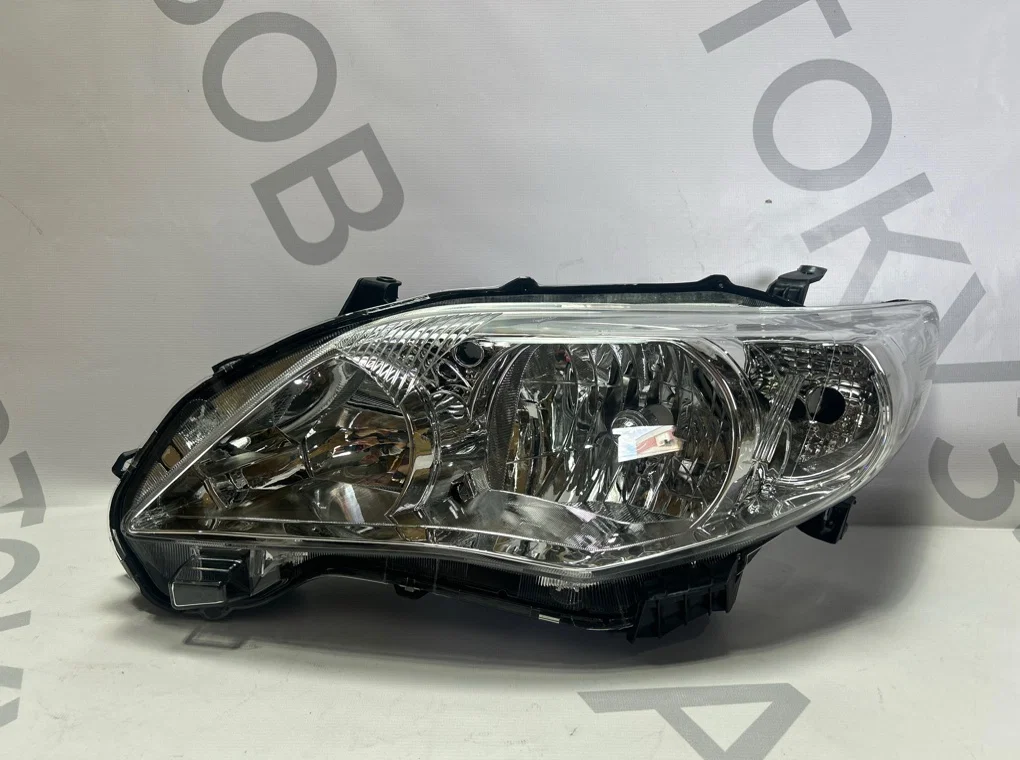 Фара левая Toyota Corolla E150 2009-2013