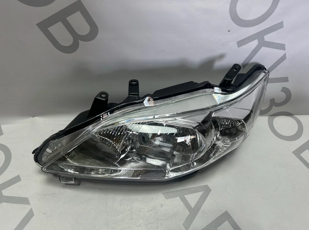 Фара левая Toyota Corolla E150 2009-2013 - миниатюра 2
