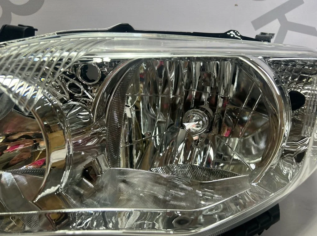 Фара левая Toyota Corolla E150 2009-2013 - миниатюра 4