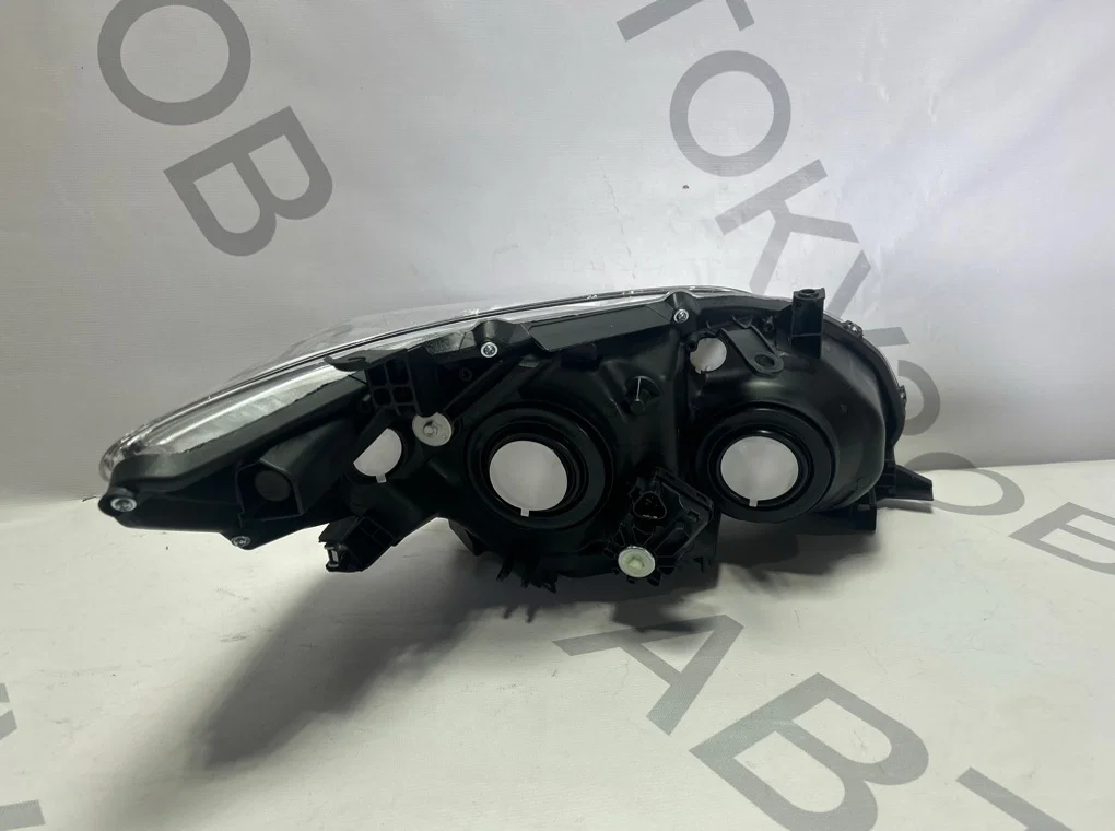 Фара левая Toyota Corolla E150 2009-2013 - миниатюра 7