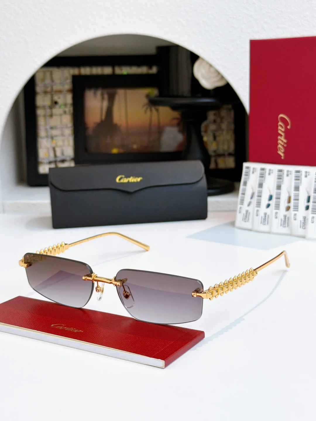 Солнцезащитные очки без оправы Cartier золотого цвета - изображение 1