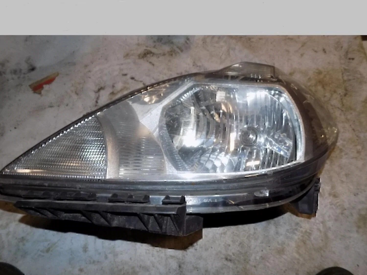 Фара левая NISSAN Tiida (C11) 2007-2014 - изображение 1