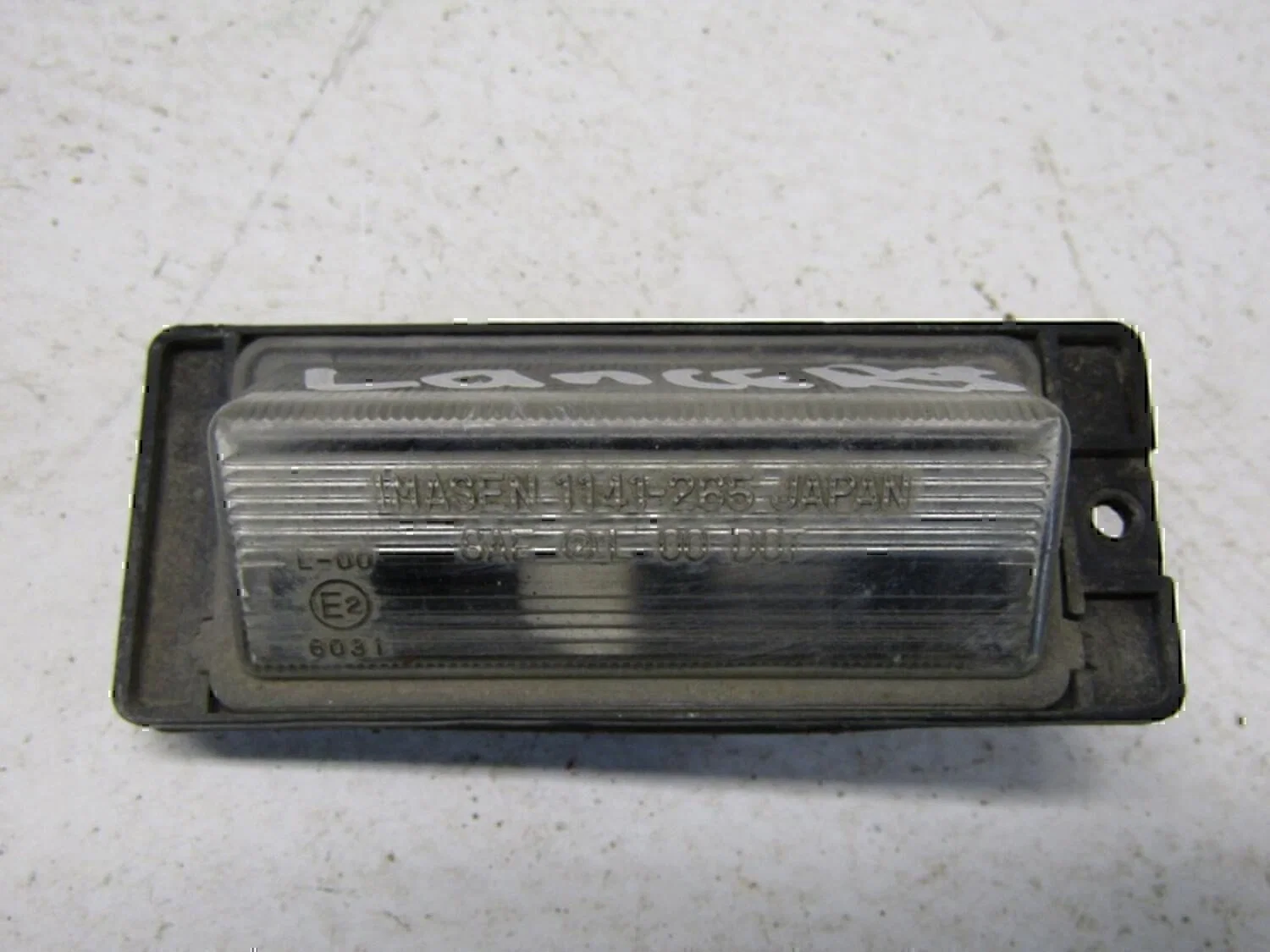 Фонарь подсветки номера MITSUBISHI Lancer (CS/Classic) 2003-2006 - изображение 1