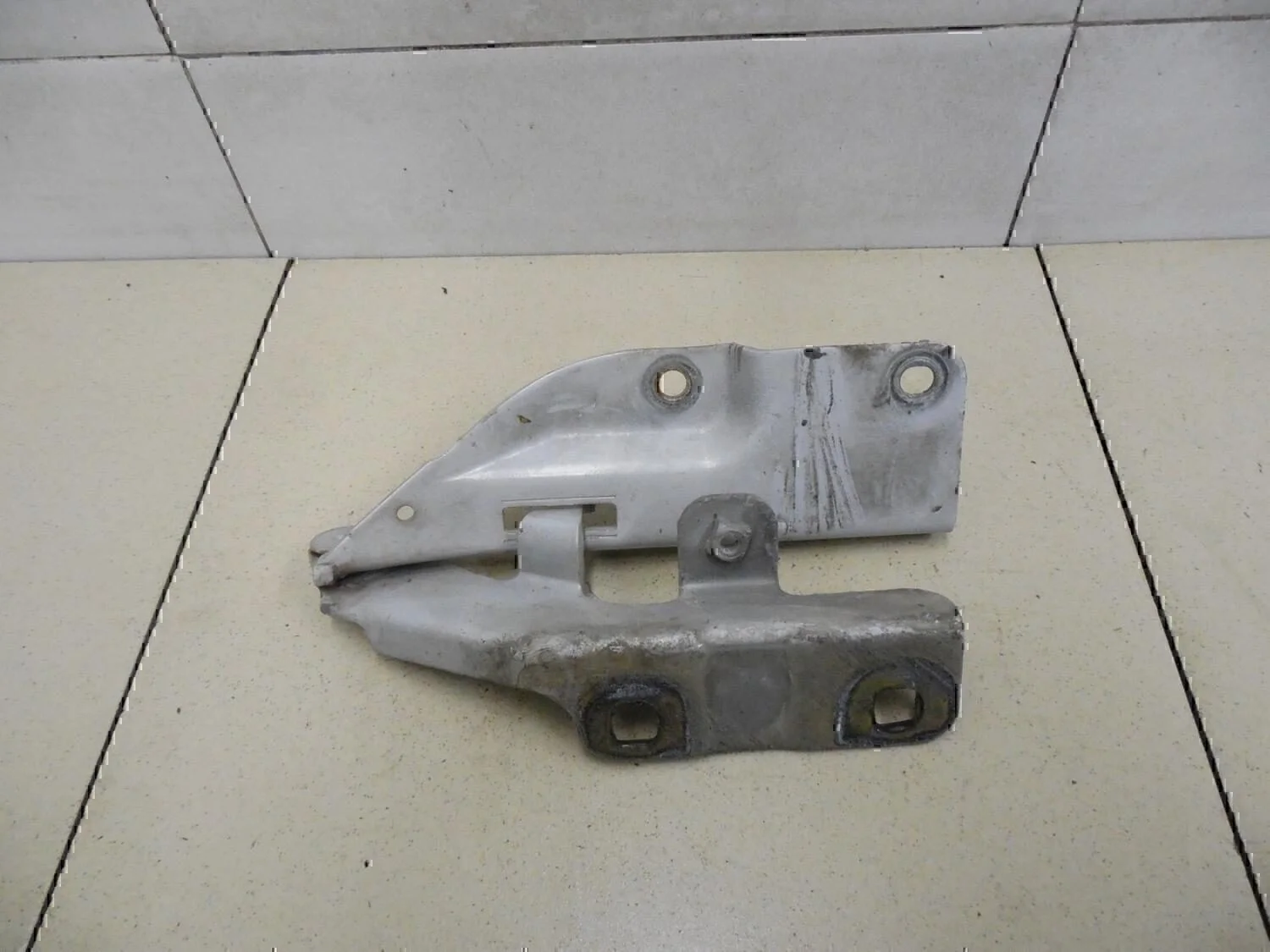 Петля капота левая NISSAN Almera Tino 2000-2006 - миниатюра 2