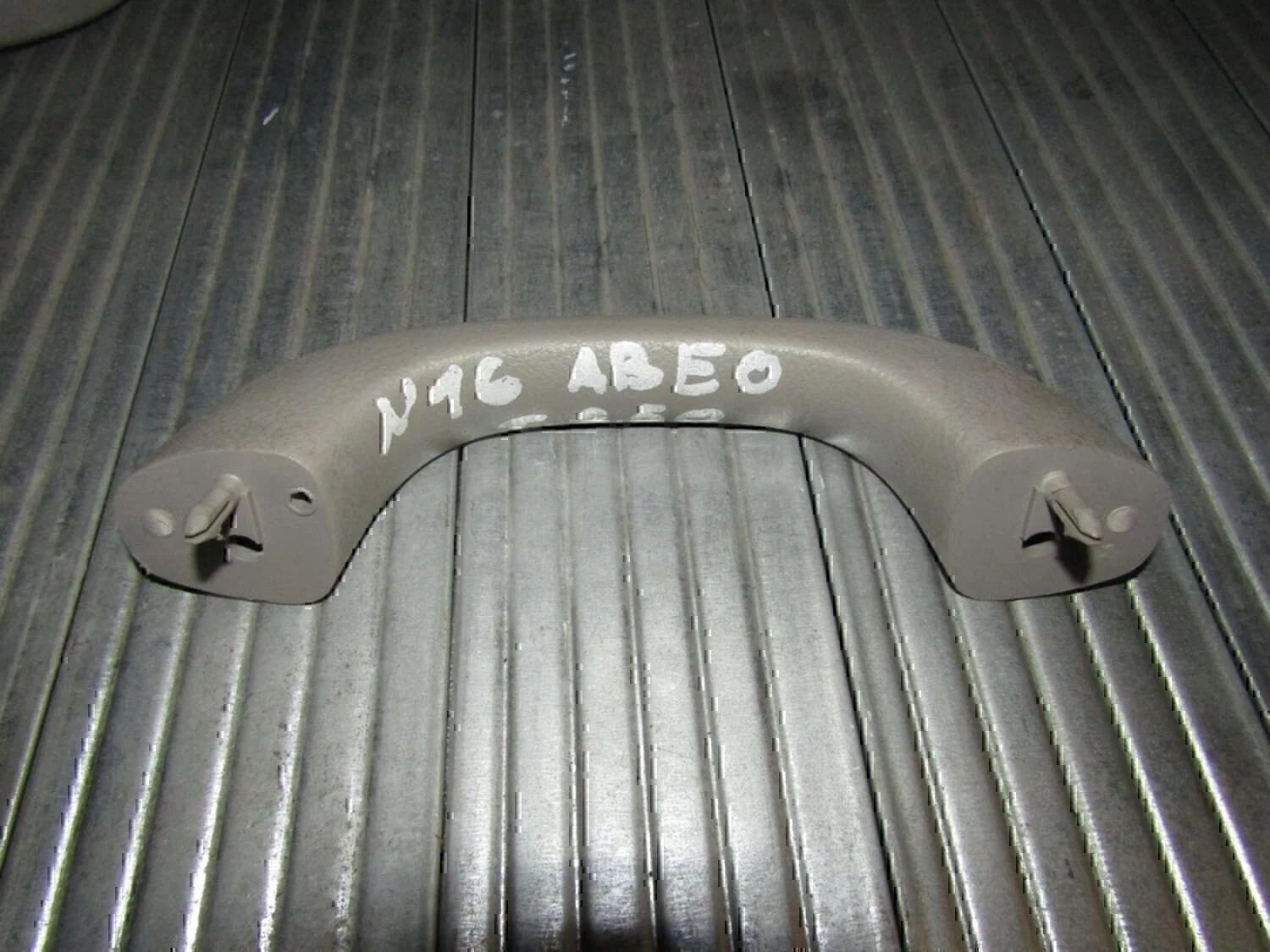 Ручка внутренняя потолочная Chevrolet Aveo (T200) 2003-2008 - миниатюра 2