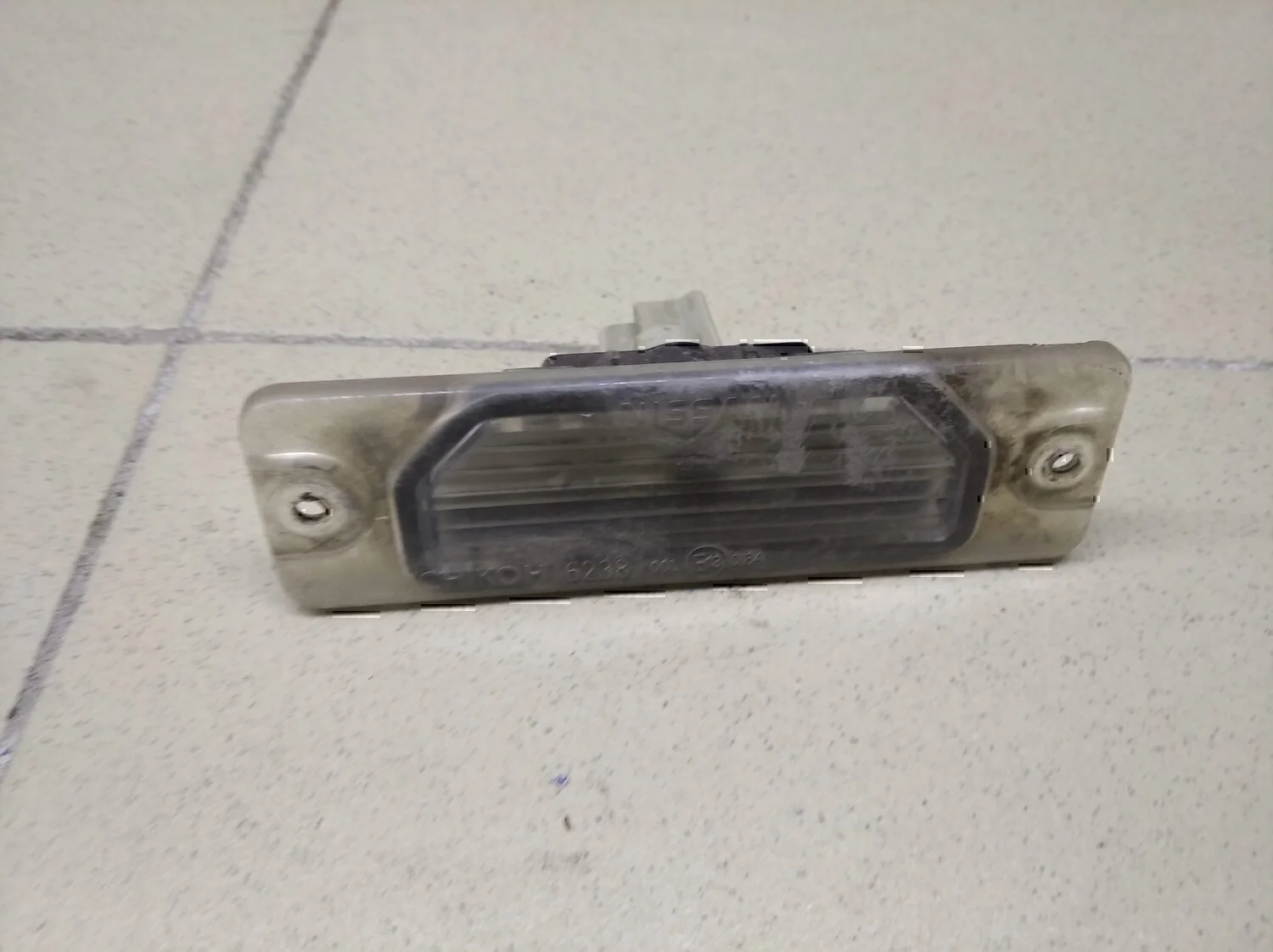 Фонарь подсветки номера NISSAN Almera N16 2000-2006 - изображение 1