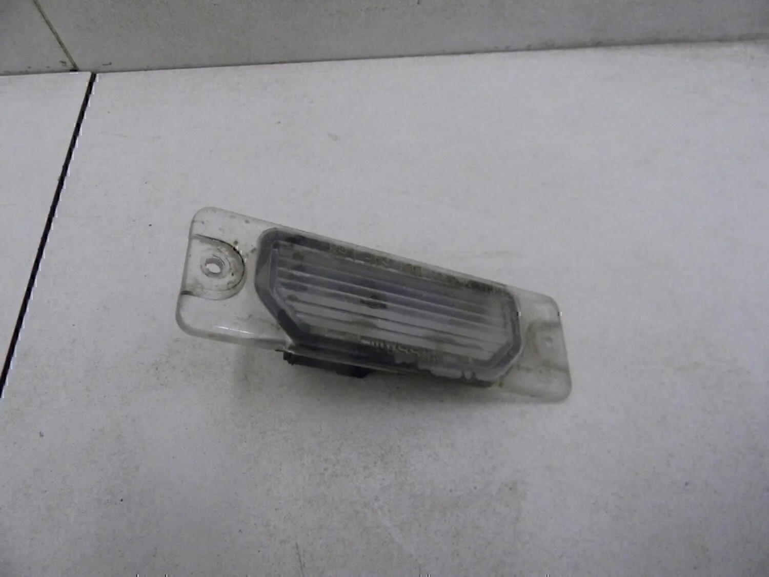 Фонарь подсветки номера NISSAN Almera N15 1995-2000 - миниатюра 4