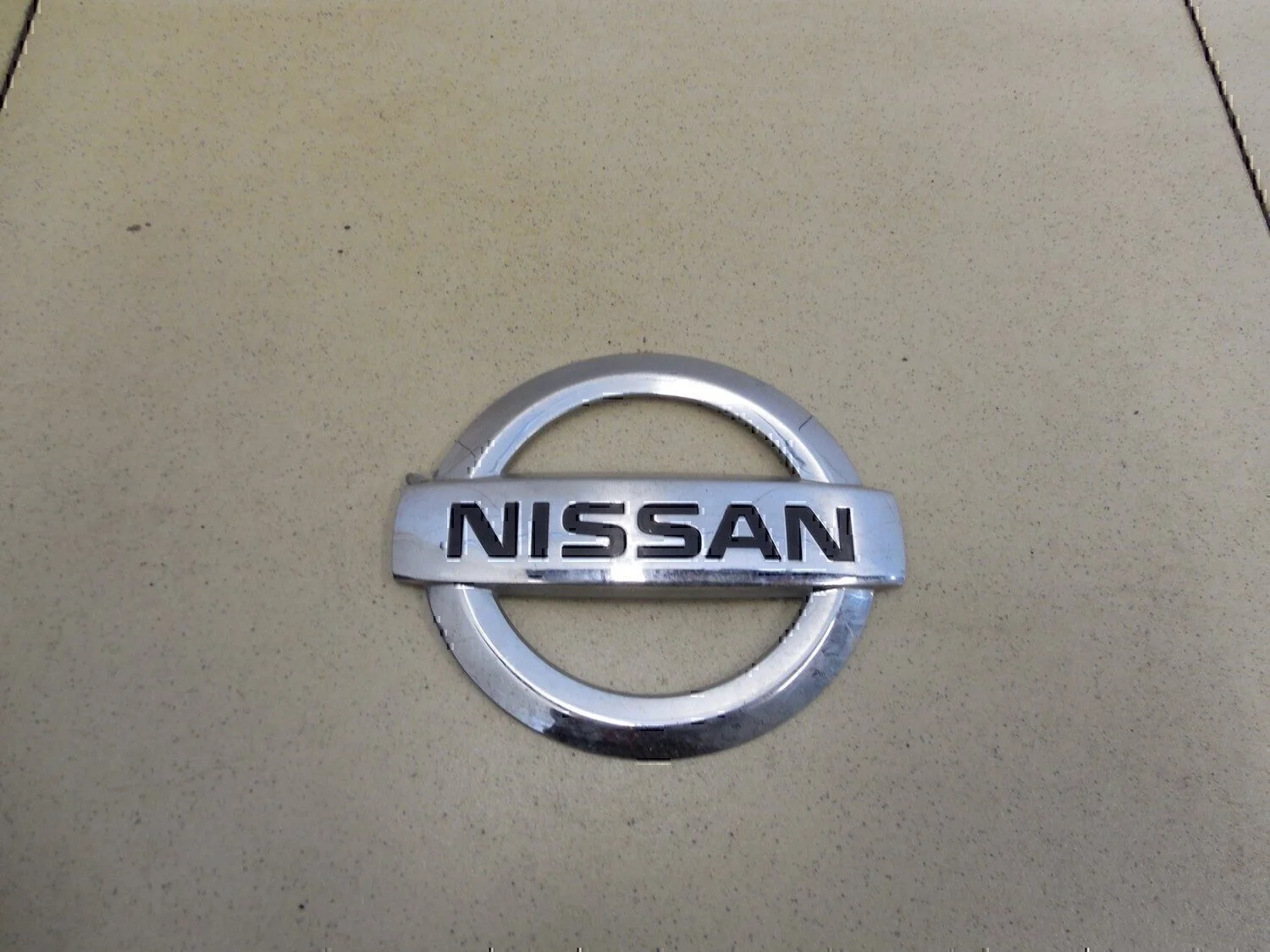 Эмблема на крышку багажника NISSAN Almera (G15) 2013> - изображение 1