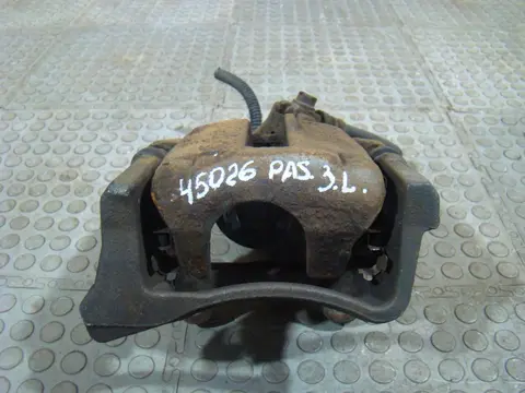 Суппорт тормозной задний левый VW Passat B6/B7/CC (под электроручник), 3AA615403