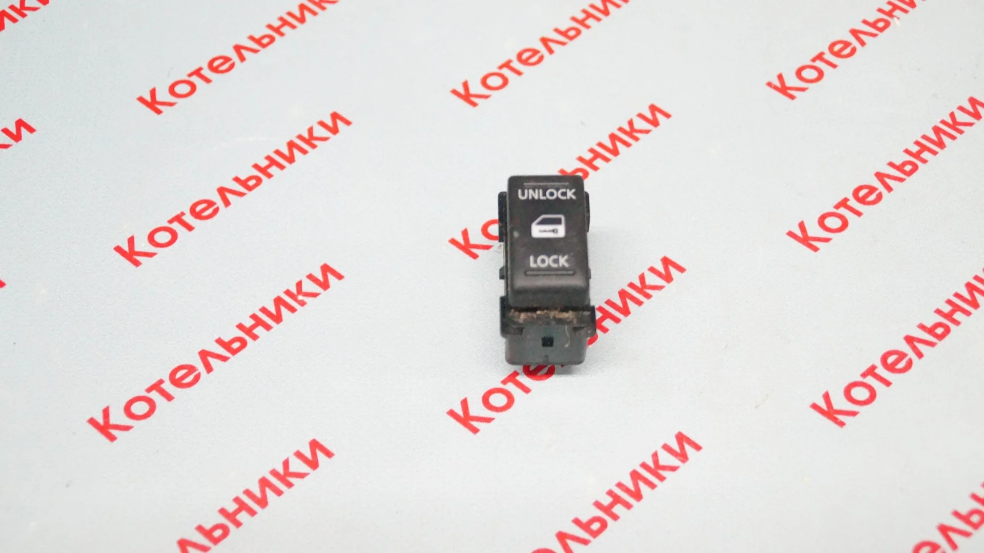 Nissan 25210-AX600 Кнопка блокировки дверей - изображение 1