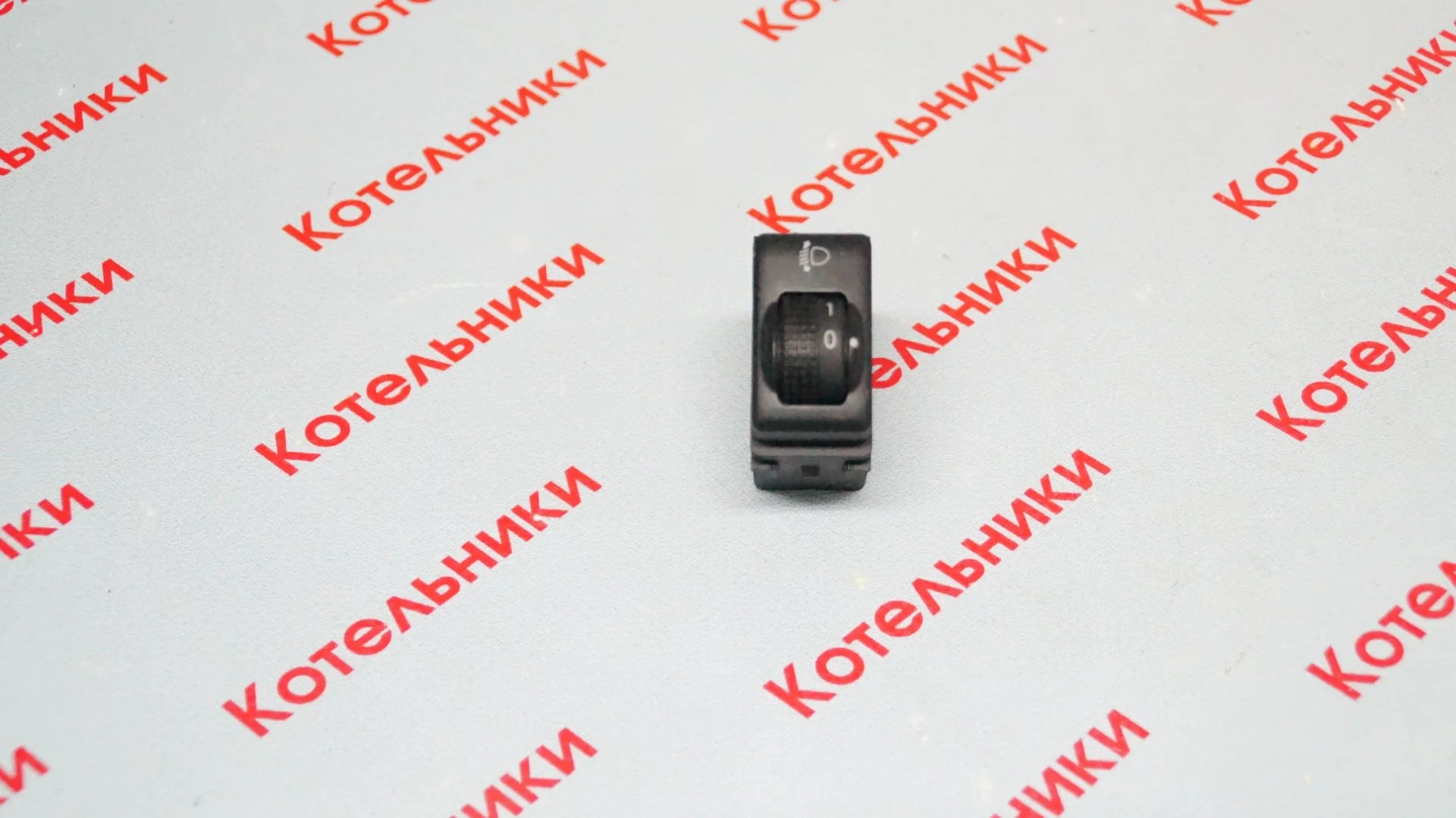 Nissan 25190-AX010 Кнопка корректора фар - изображение 1