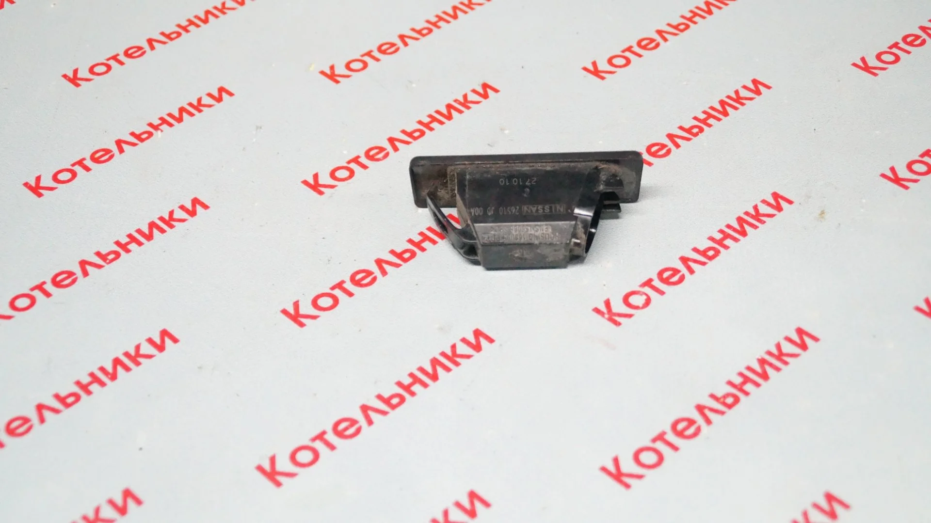 Nissan 26510-JD00A Фонарь подсветки номера - миниатюра 3