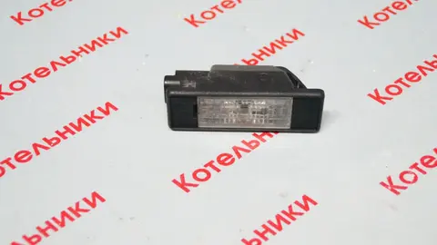 Nissan 26510-AU300 Фонарь подсветки номера