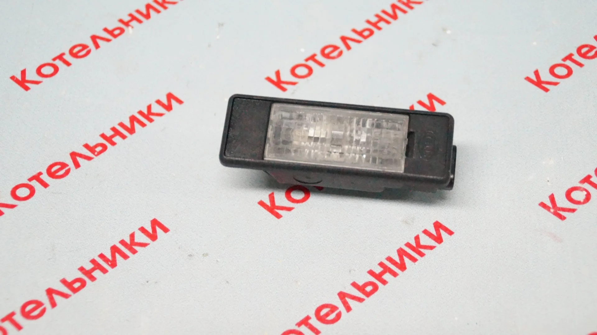 Nissan 26510-AU300 Фонарь подсветки номера - миниатюра 4