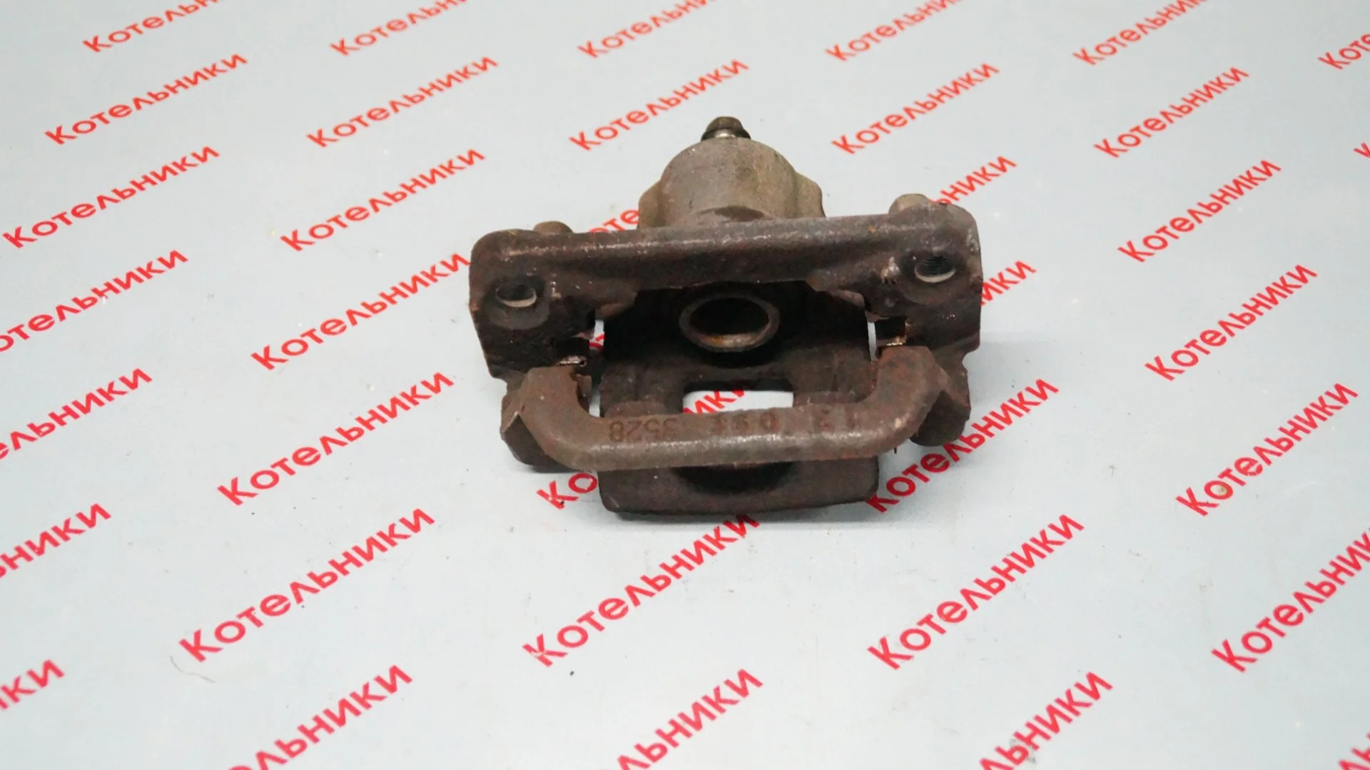 Nissan 44011-1KD0A Суппорт задний левый - миниатюра 4