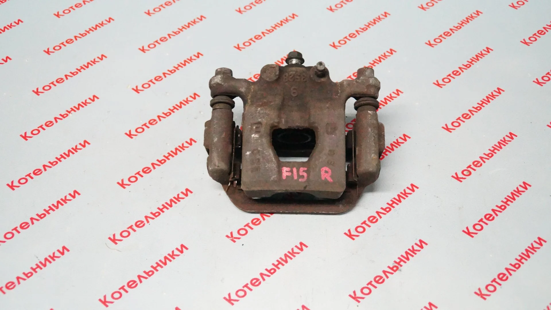 Nissan 44001-1KD0A Суппорт задний правый - изображение 1