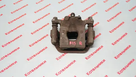 Nissan 44001-1KD0A Суппорт задний правый