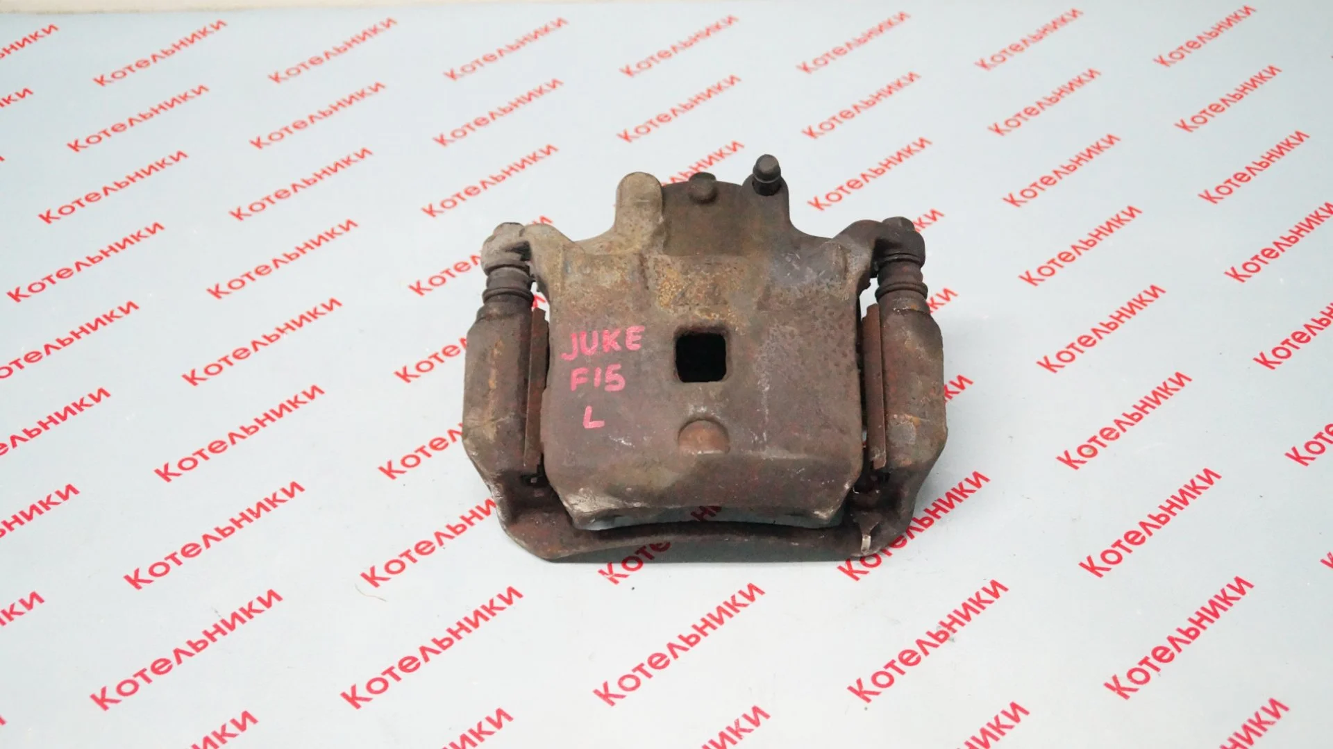 Nissan 41011-ET00A Суппорт передний левый - изображение 1