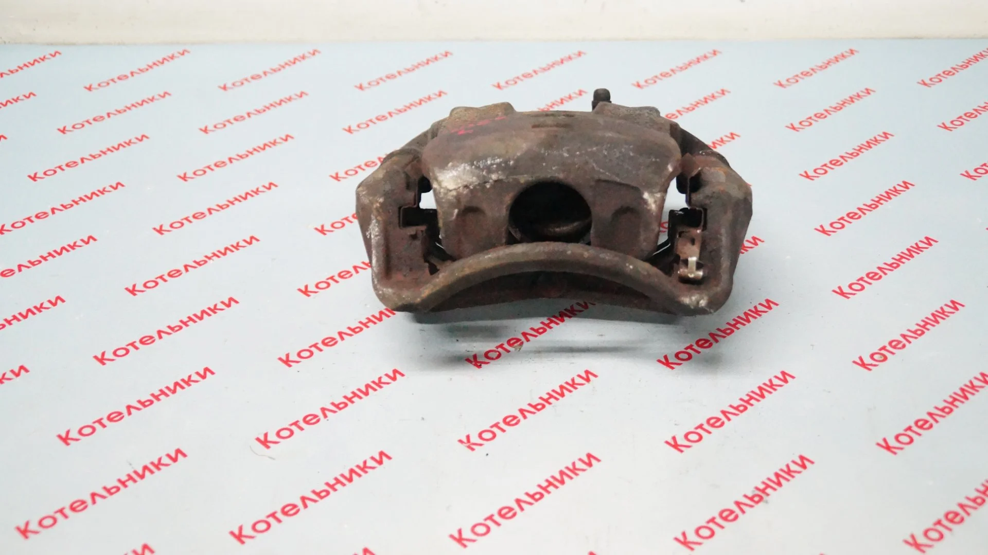 Nissan 41011-ET00A Суппорт передний левый - миниатюра 2