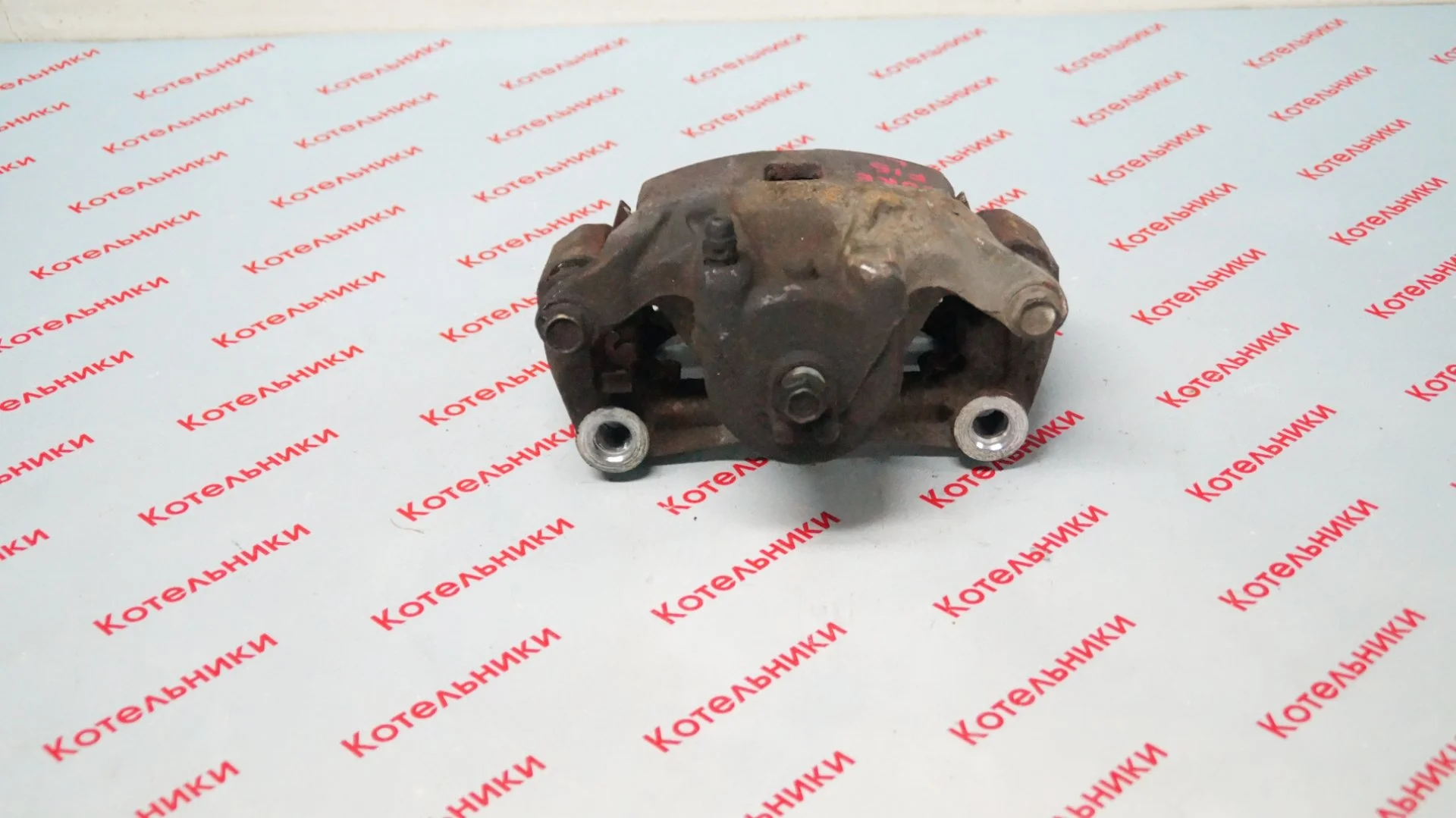 Nissan 41011-ET00A Суппорт передний левый - миниатюра 3