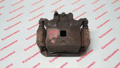 Nissan 41001-ET00A Суппорт передний правый