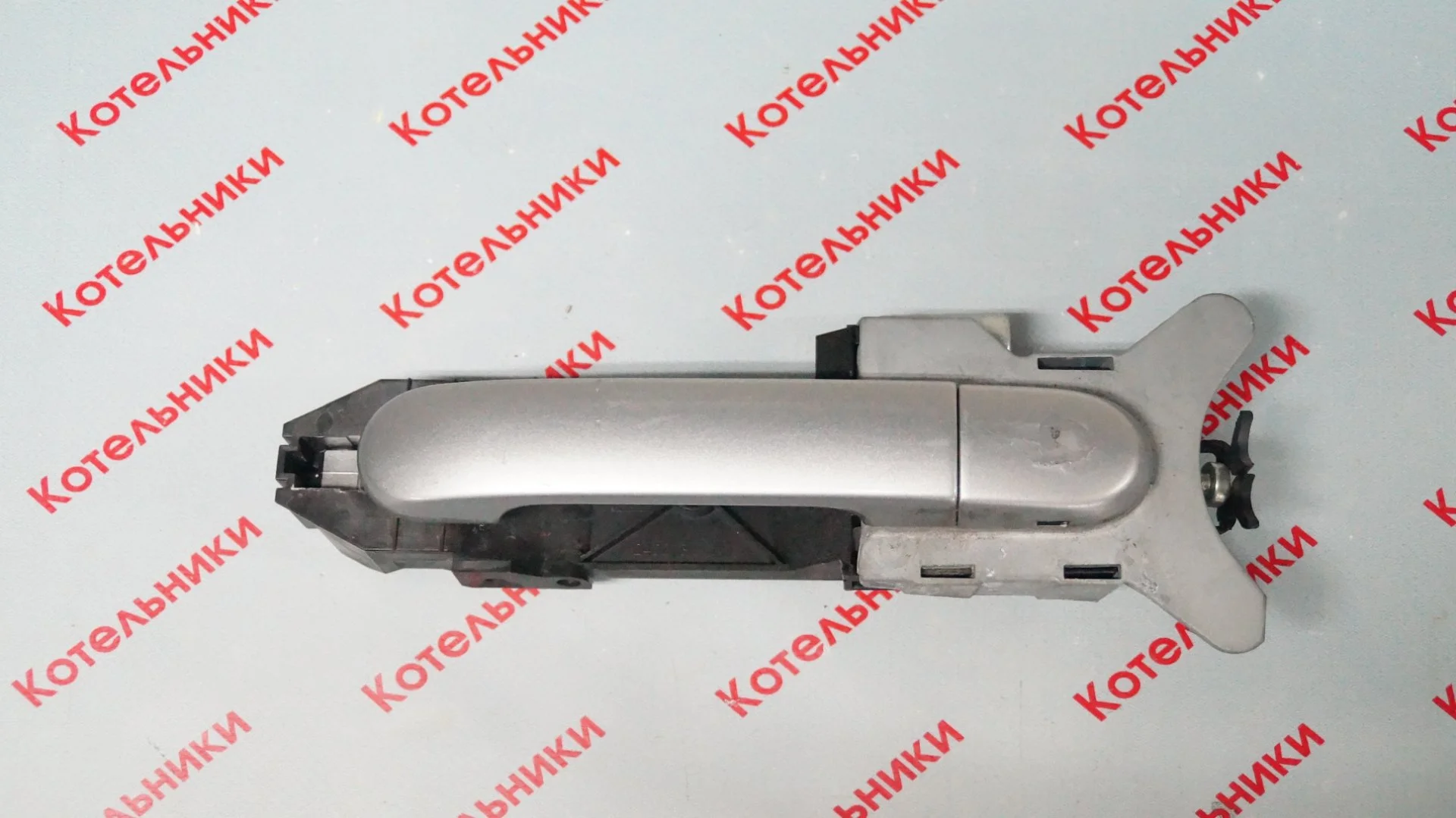 Nissan 80611-AX621 Ручка передняя левая - изображение 1