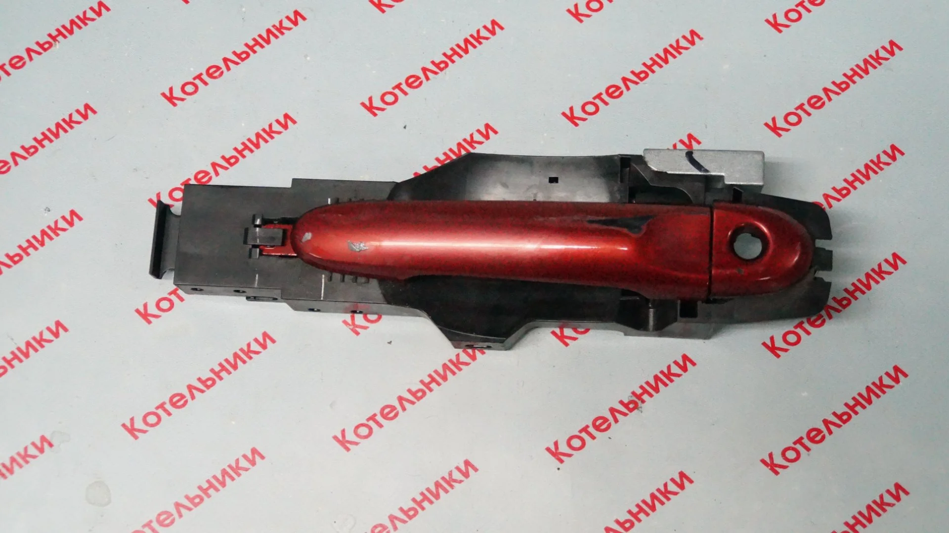 Nissan 80611-1HB1A Ручка передняя левая - изображение 1