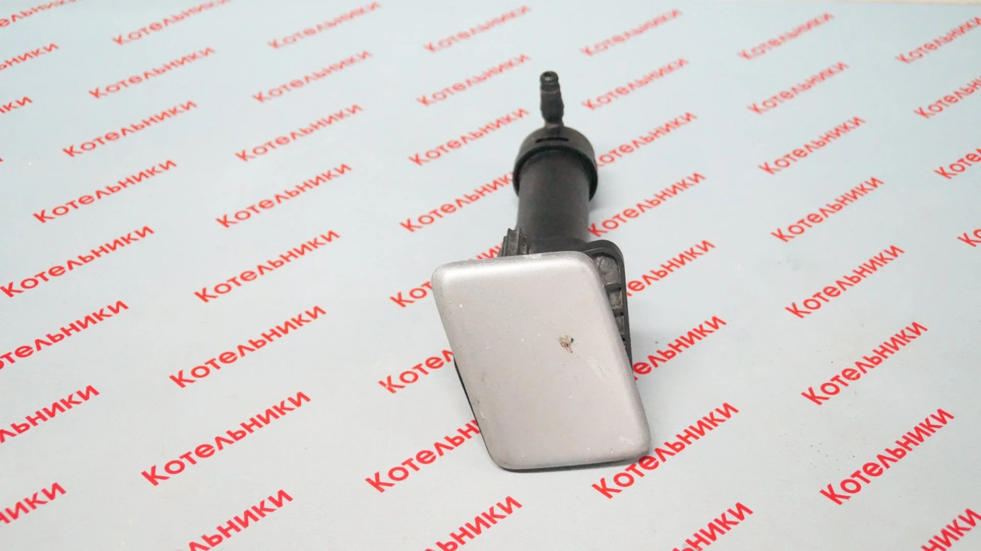 Nissan 28659-AU300 Форсунка омывателя фары L - миниатюра 2