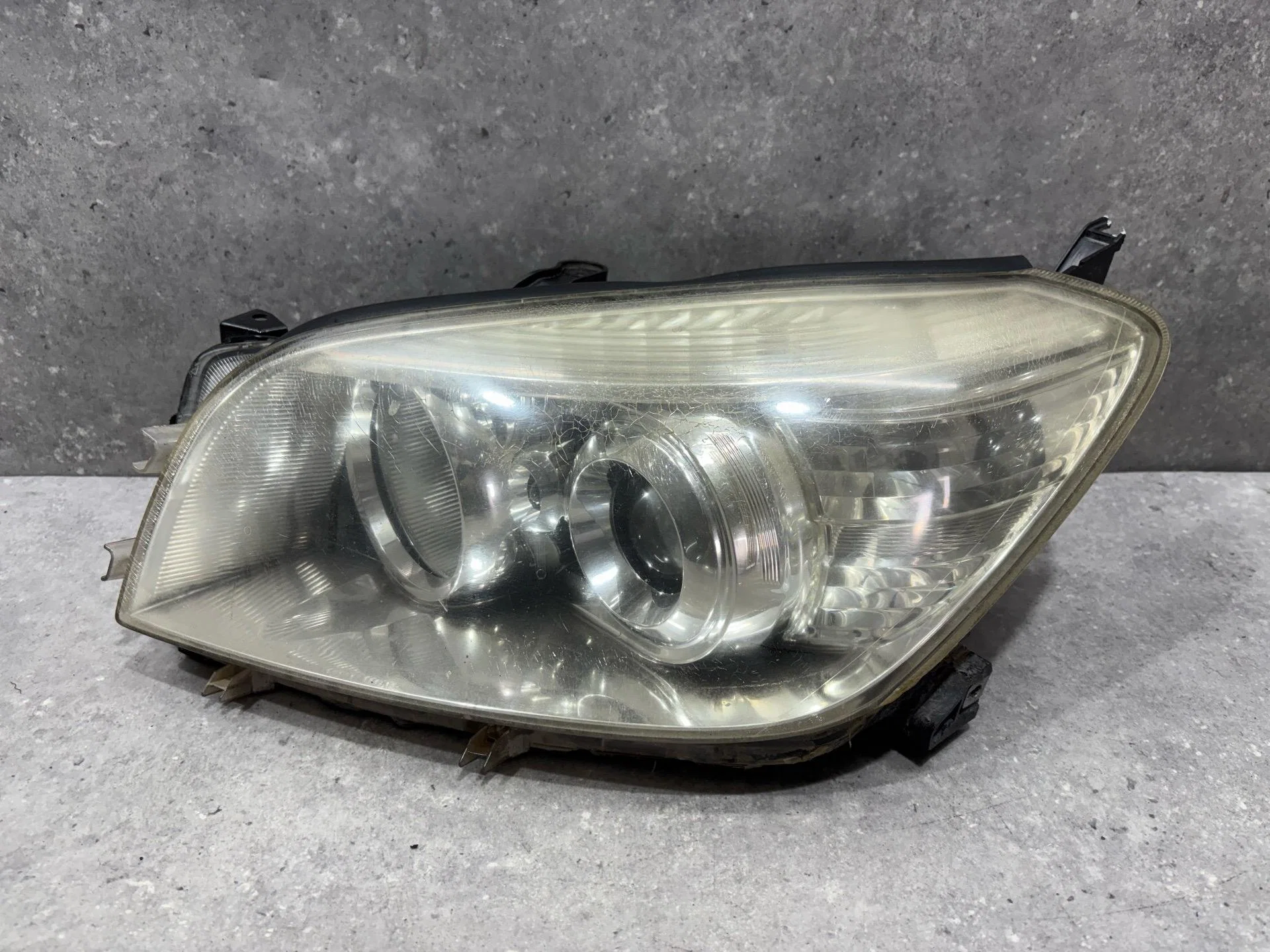 Фара левая Toyota RAV4 3 XA30 ACA30 2008 - миниатюра 4