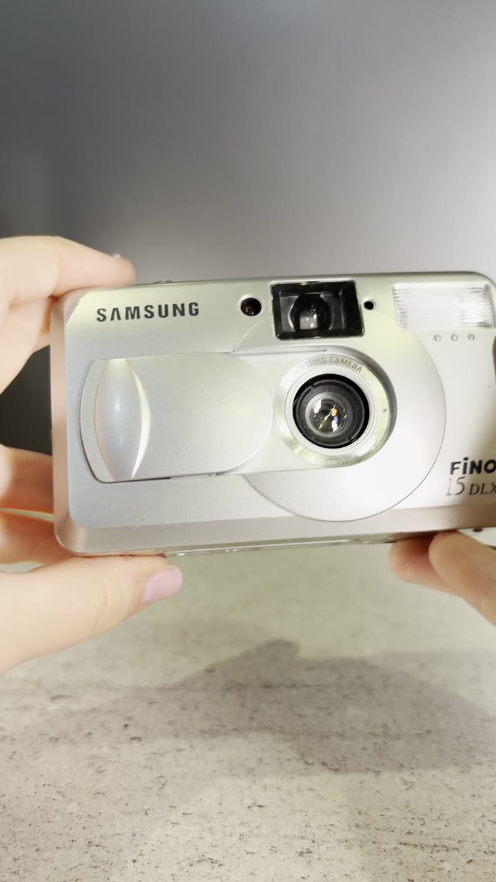 Samsung Fino 15 DLX - Пленочный фотоаппарат - видео 6