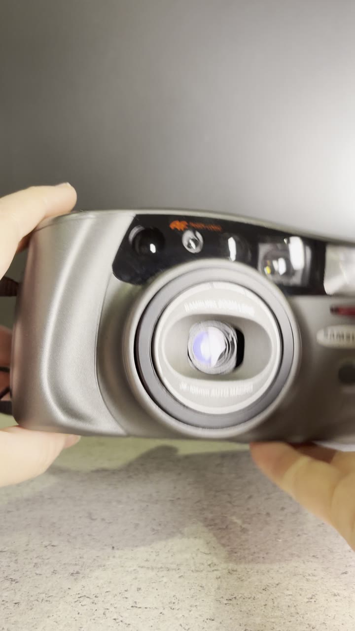 Samsung AF zoom 105S - Пленочный фотоаппарат - видео 6