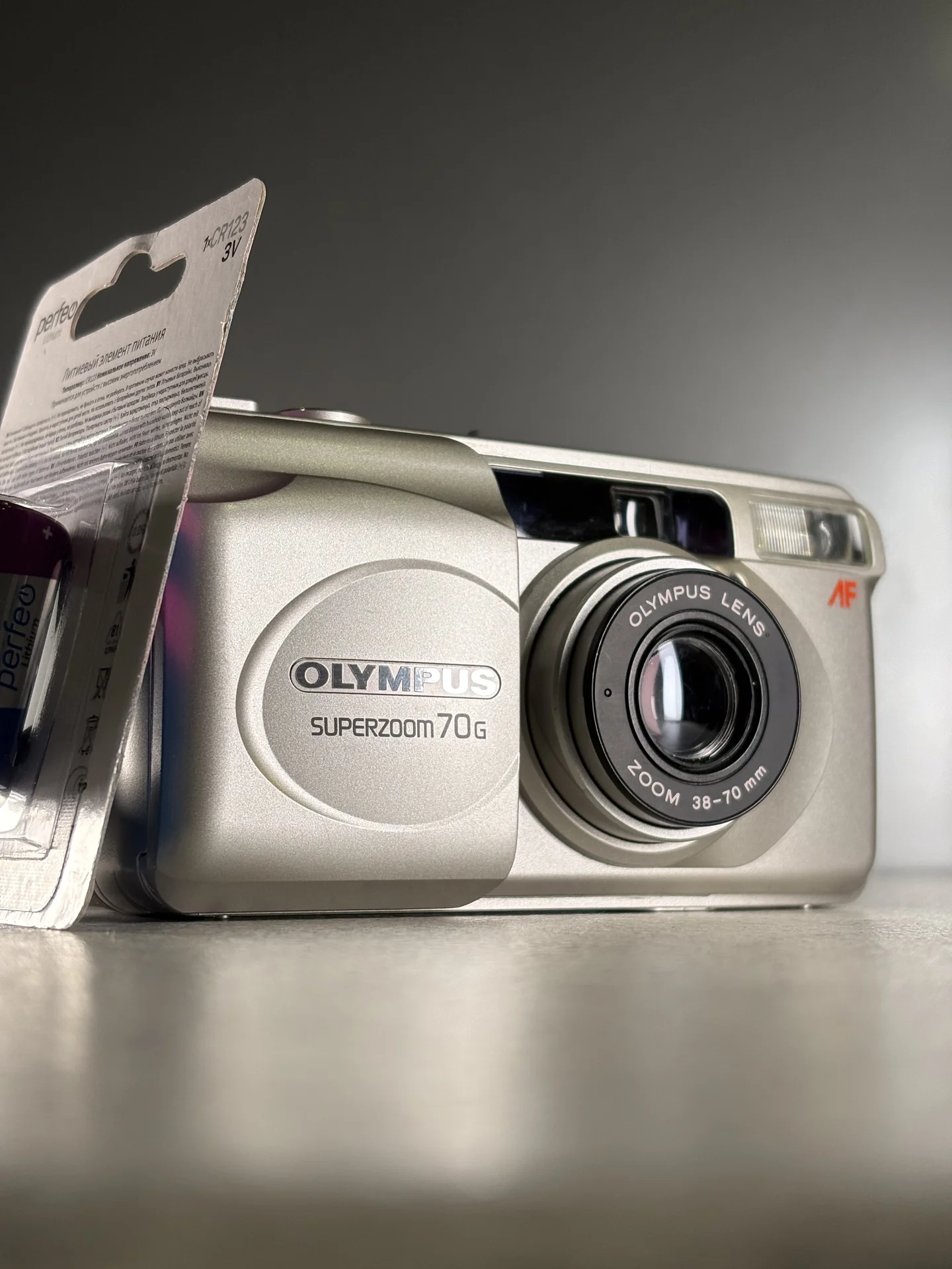 Olympus Superzoom 70g (date) Пленочный фотоаппарат - изображение 1