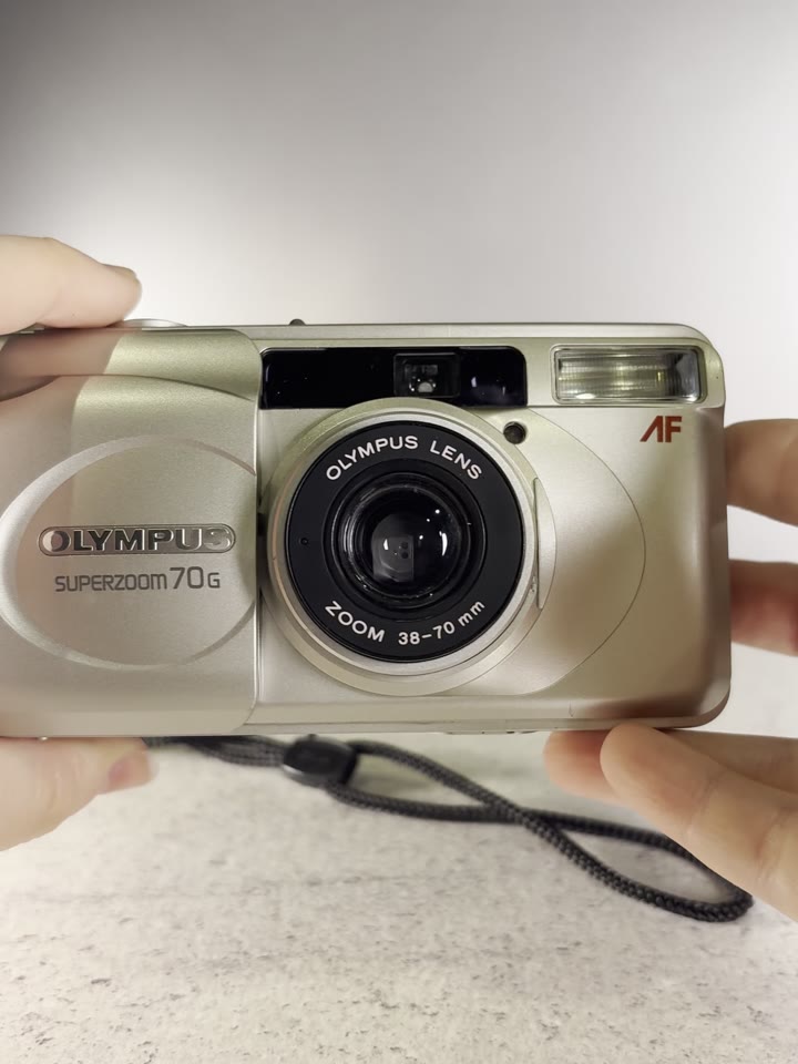 Olympus Superzoom 70g (date) Пленочный фотоаппарат - видео 6