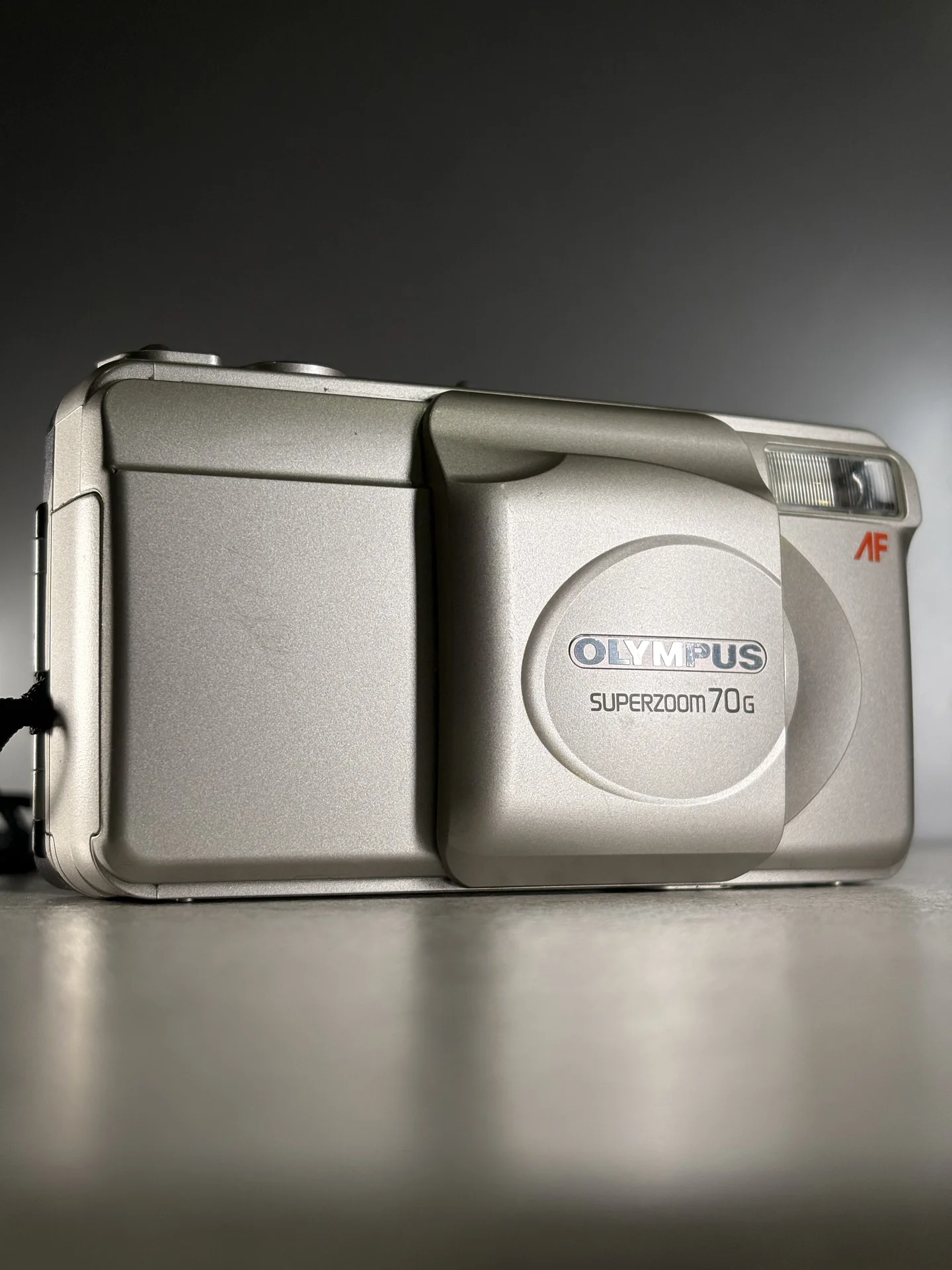 Olympus Superzoom 70g (date) Пленочный фотоаппарат - миниатюра 7